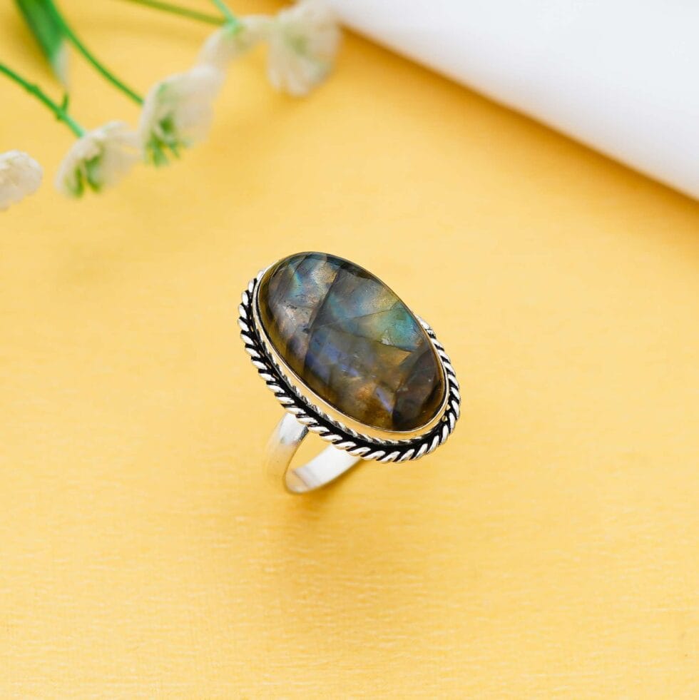 Oval labradorite gemstone ring with silver rope design setting for women’s jewellery
