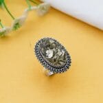 Oval pyrite gemstone ring with antique silver setting for women’s fashion jewellery