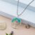Tree of Life pendant necklace with turquoise crystal stones and silver chain for women’s jewellery