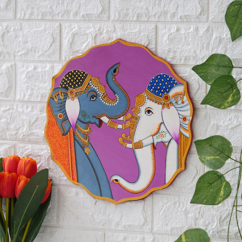 Hand-painted Rajasthani elephant duo artwork — traditional Indian decor symbolizing love and royalty.