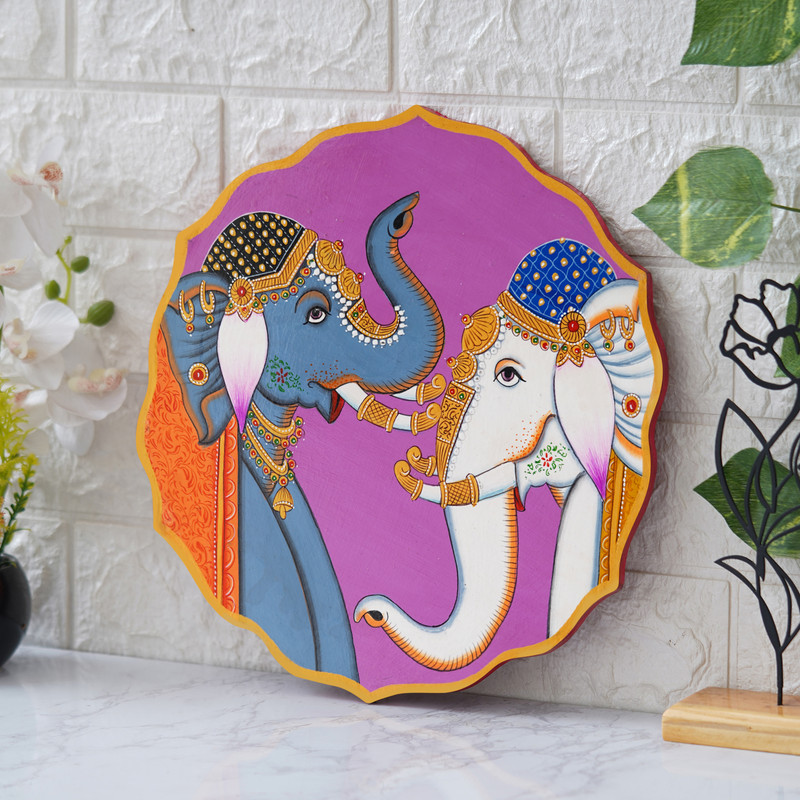 Royal Pichwai elephant couple painting on pink background — elegant Indian wall art for cultural interiors.