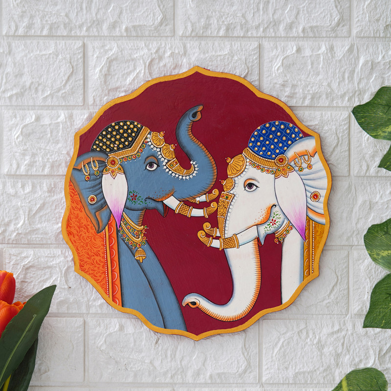 Hand-painted Rajasthani elephant duo artwork — elegant wall decor symbolizing strength and prosperity.