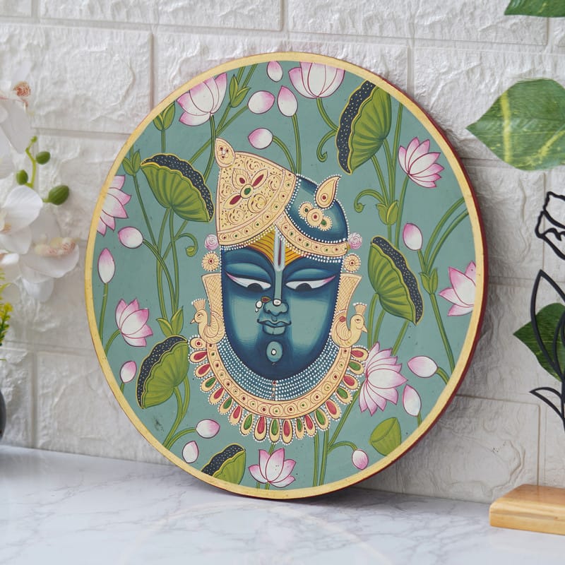 Elegant Pichwai painting of Lord Krishna’s face with lotus flowers — traditional Nathdwara-inspired wall art.