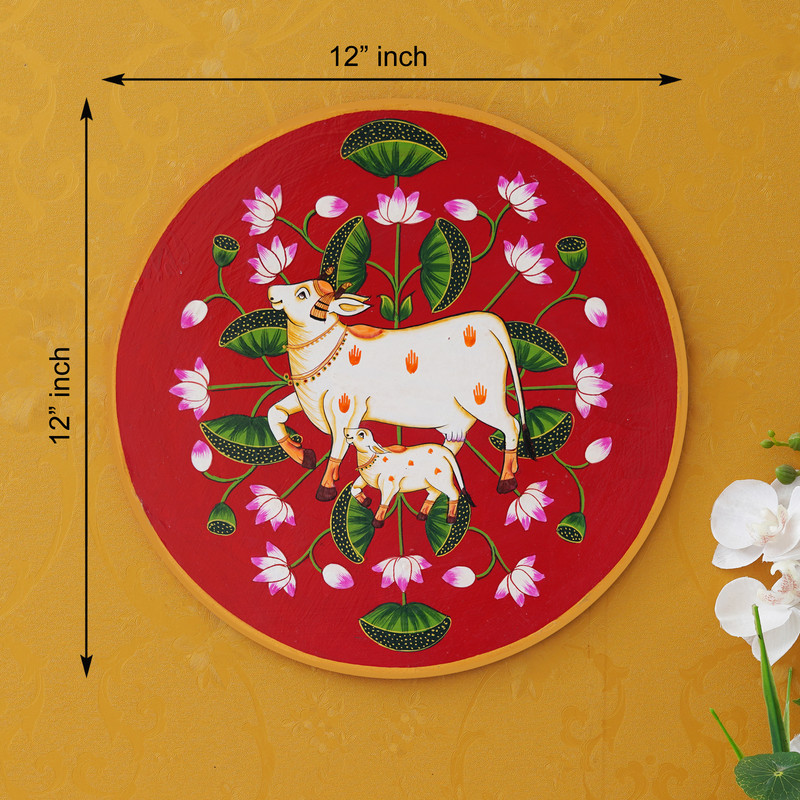 Traditional Rajasthani Pichwai painting of cow and calf with floral pattern – perfect for living room decor.
