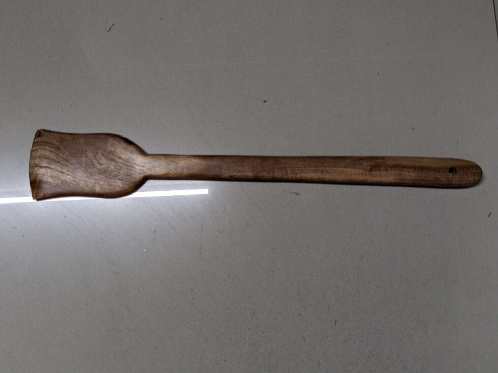 Eco-friendly wooden utensil set handcrafted for cooking, serving, and kitchen décor.