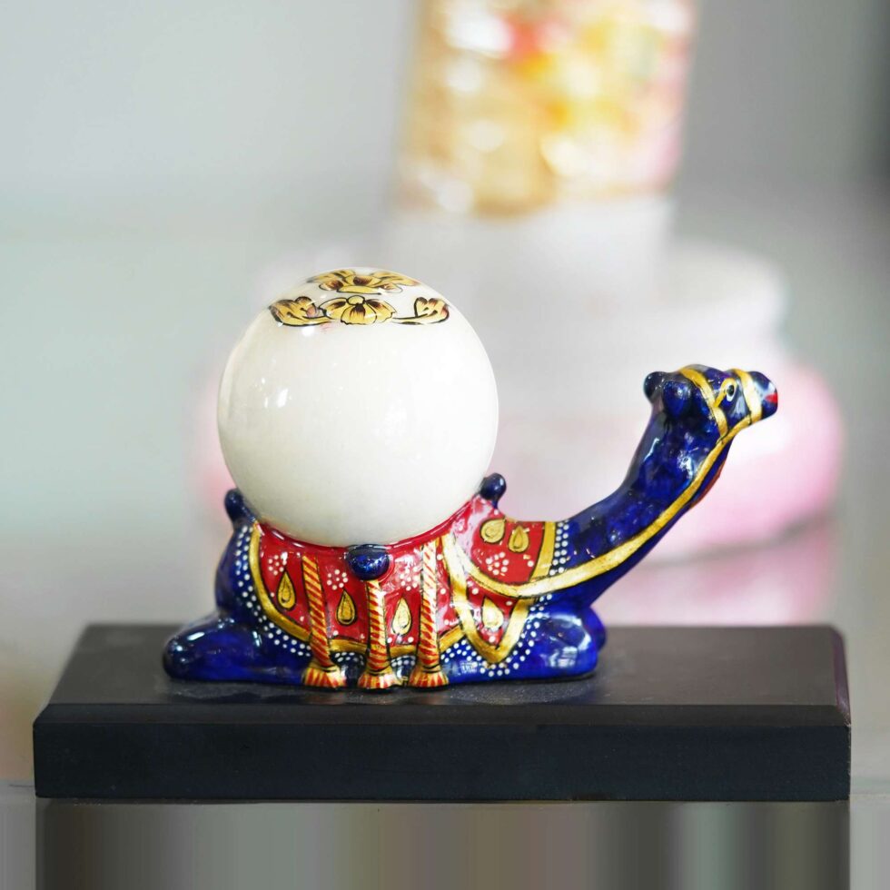 Hand-painted Rajasthani camel tabletop clock in vibrant blue and red enamel design.