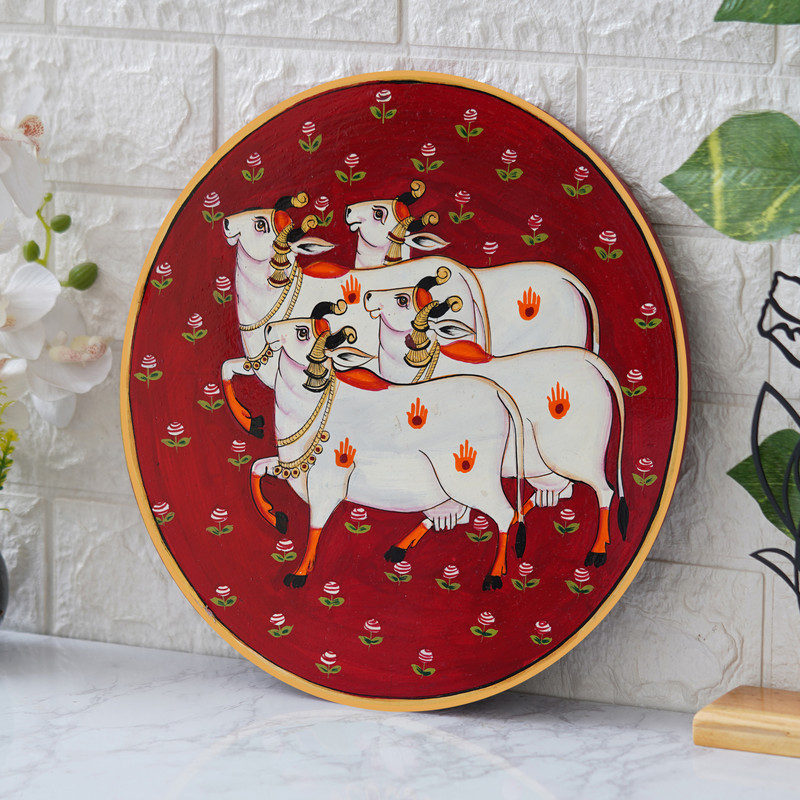 Traditional Pichwai cow herd painting on red background – spiritual Indian wall art decor for living room.