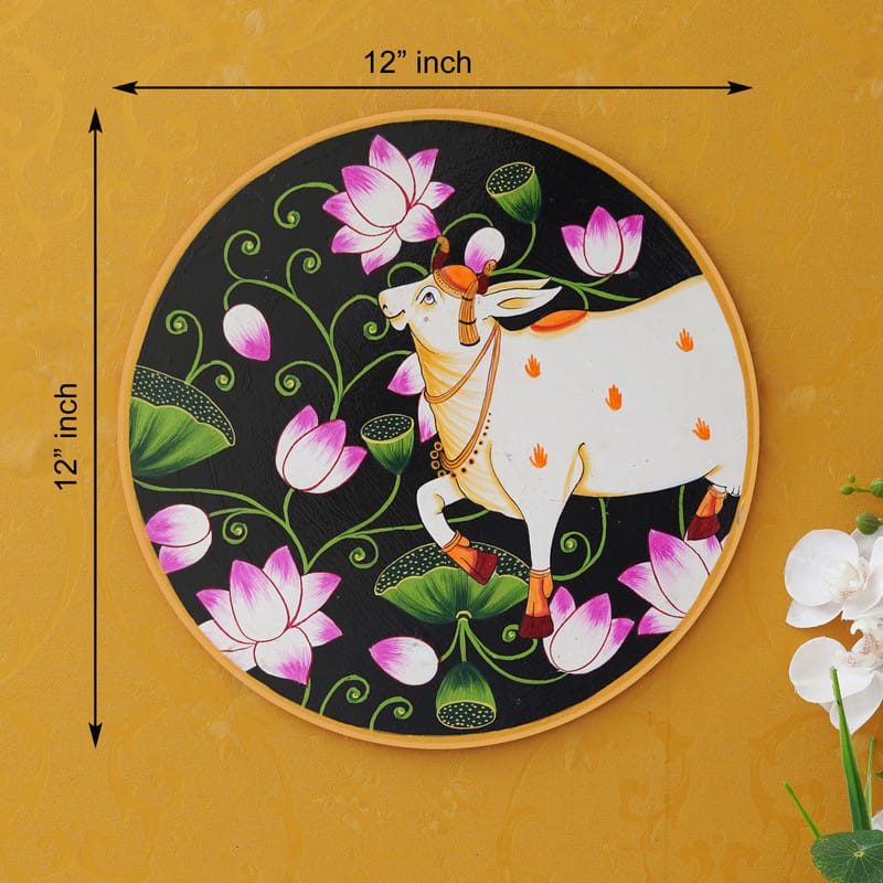 Beautiful white cow Pichwai artwork with floral design – cultural Indian wall decor for pooja or living room.