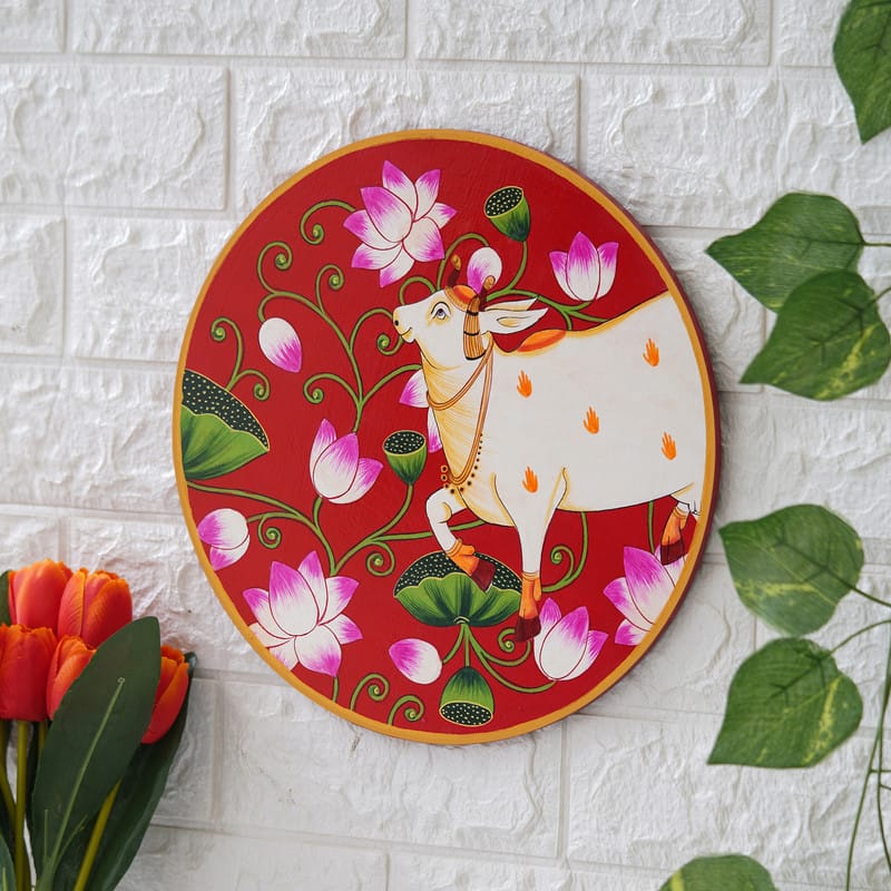 Traditional Pichwai cow painting with pink lotus flowers – vibrant Indian wall art decor for living room.