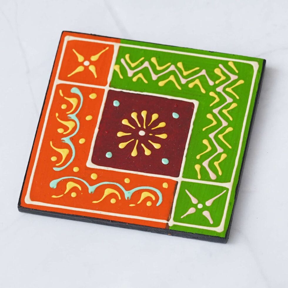 Artisan-crafted wooden coasters with vibrant ethnic patterns, ideal handmade gift for Diwali celebrations