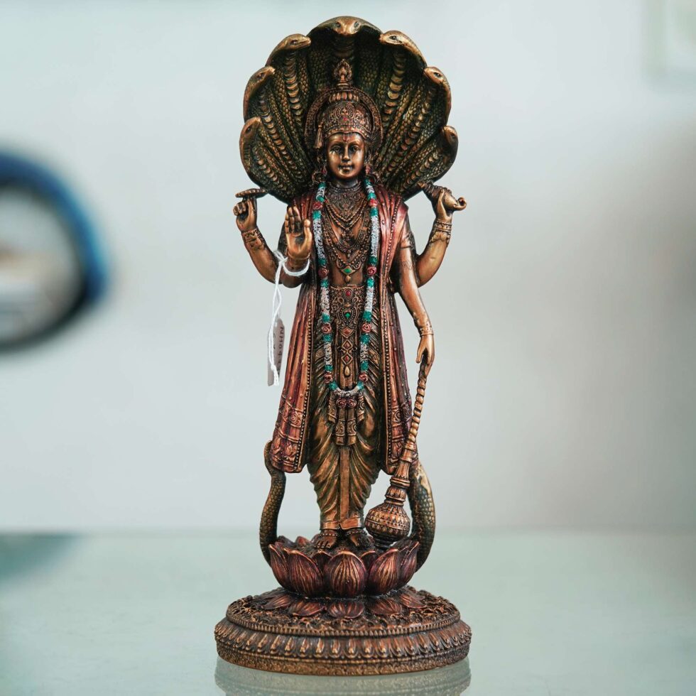 Traditional Sheshnag Vishnu idol in bronze finish, auspicious decor piece for Diwali celebrations