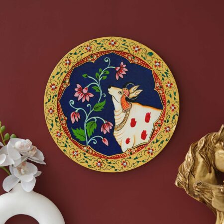 Vintage-style cow and lotus Pichwai wall painting – artistic Indian decor for living room or office.