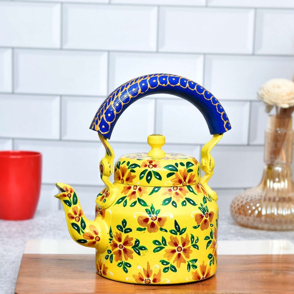 Colorful enamel-painted steel tea kettle featuring vibrant traditional flower motifs