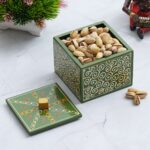 Artistic handcrafted wooden dry fruit box with lid, traditional Indian design for home and festive gifting.