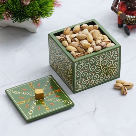Artistic handcrafted wooden dry fruit box with lid, traditional Indian design for home and festive gifting.