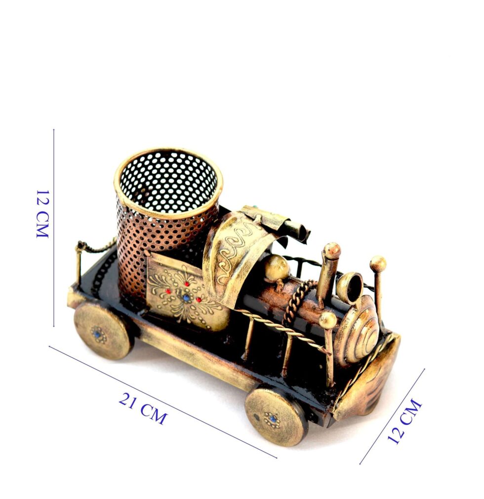 Artisan-crafted brass train pen holder with engraved floral design, perfect Diwali gift item
