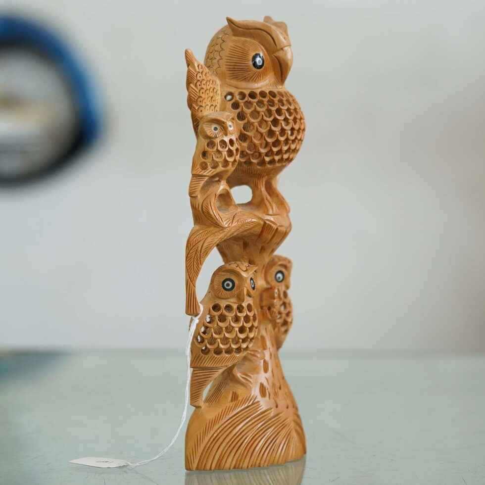Hand-carved wooden owl family sculpture – intricate craftsmanship symbolizing wisdom and unity