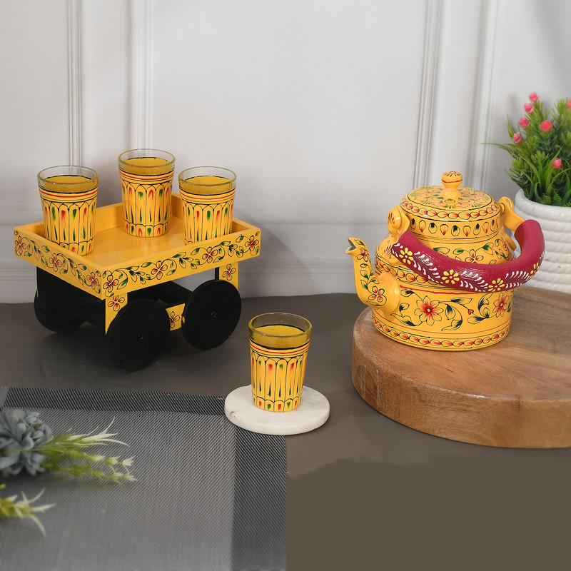 Handmade stainless steel kettle and cart set with ethnic Indian artwork, perfect for decor