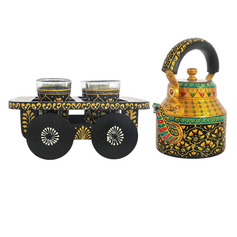 Colorful Indian art-inspired tea set featuring traditional black and gold enamel patterns