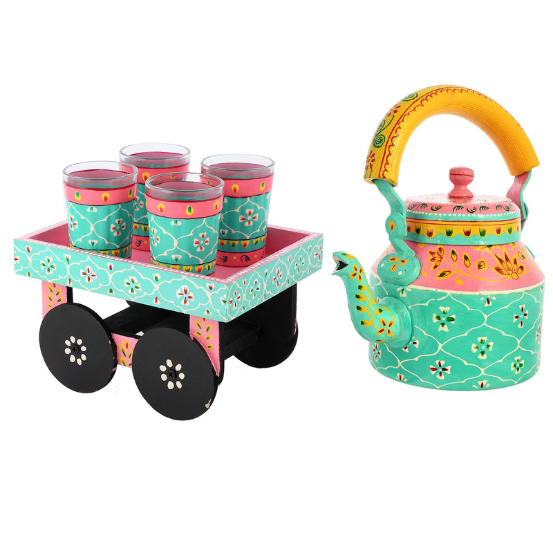 Colorful Indian art-inspired tea set featuring enamel-painted kettle and wooden trolley