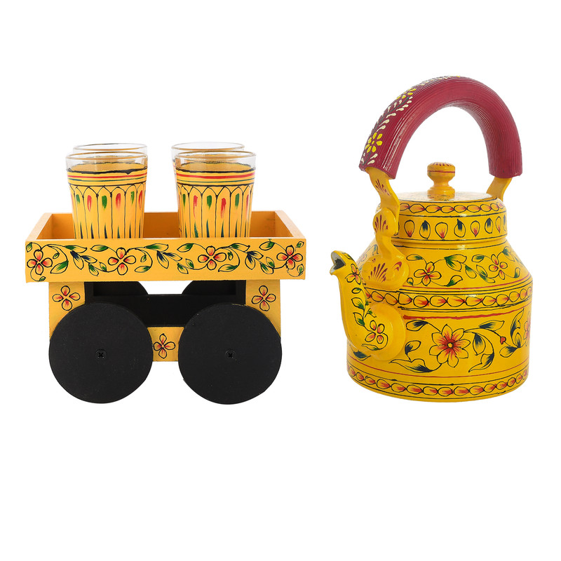 Hand-painted yellow wooden tea cart with matching floral steel kettle and glasses