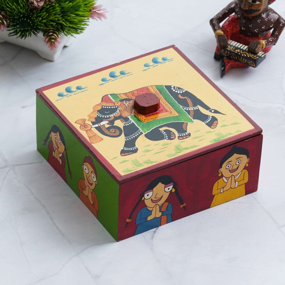 Colorful handcrafted wooden box featuring elephant motif and children illustration, perfect for festive gifting and decor.