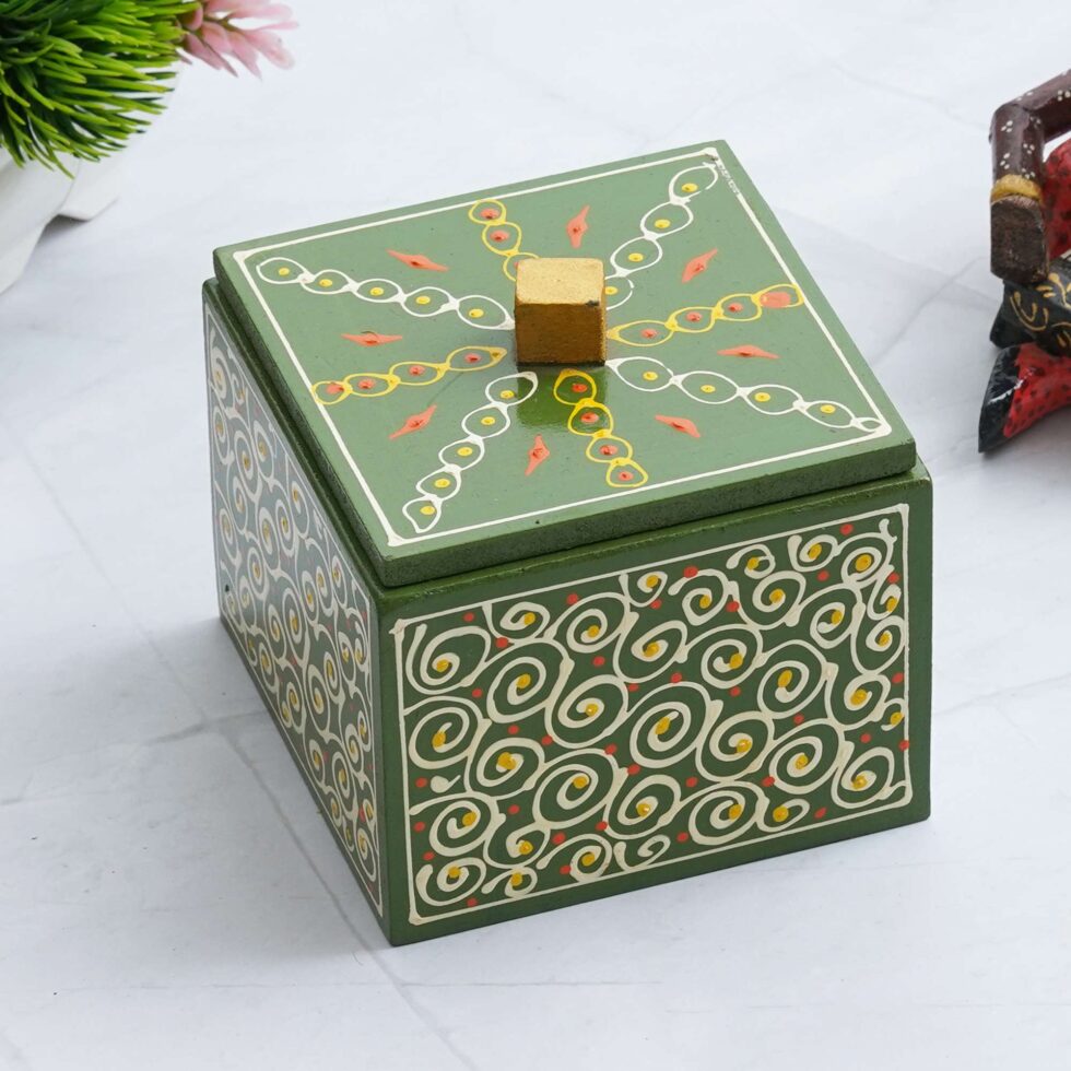 Decorative wooden dry fruit box with traditional Indian artwork, handmade storage container for gifting.