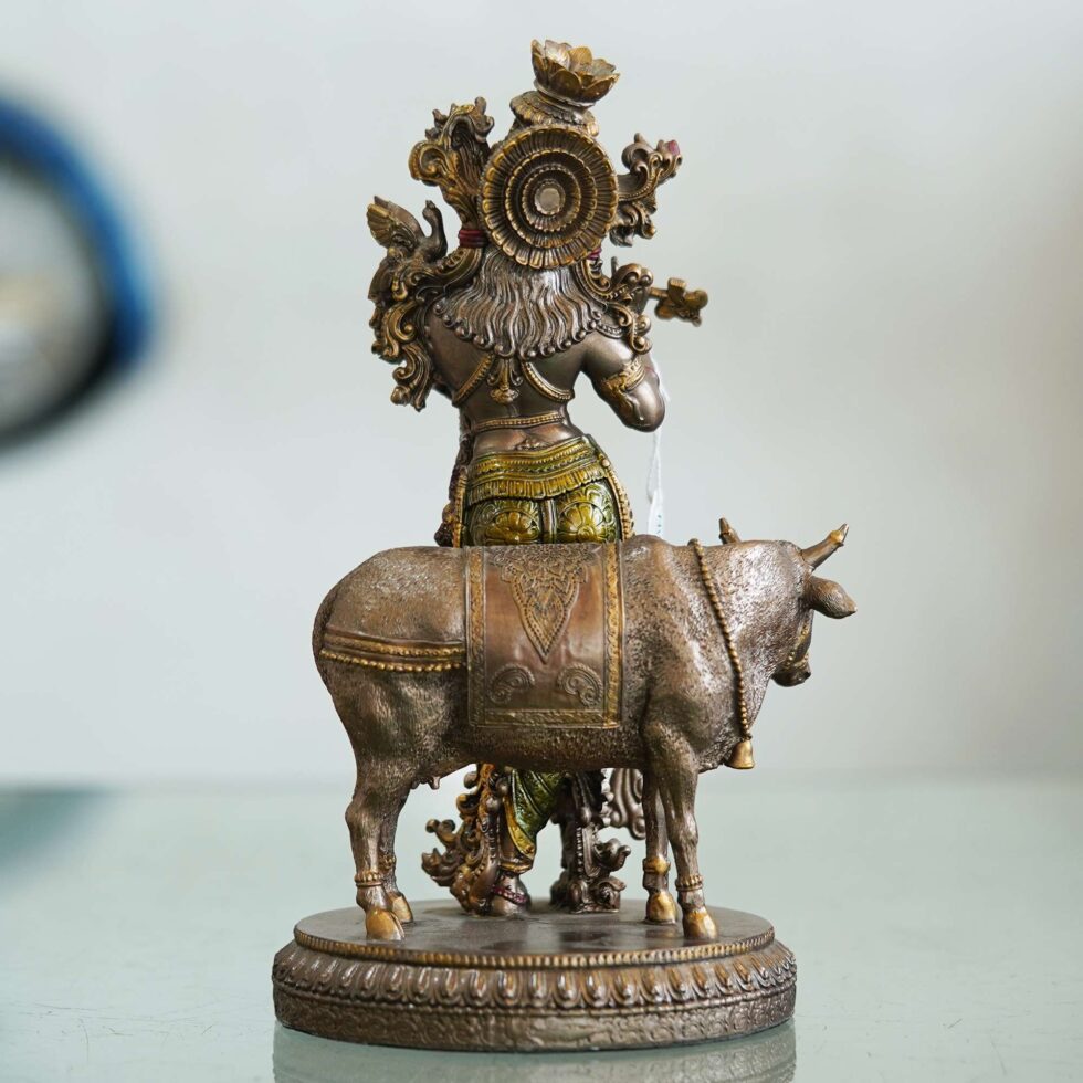 Antique bronze Krishna idol with intricate detailing, perfect spiritual gift for Diwali festival