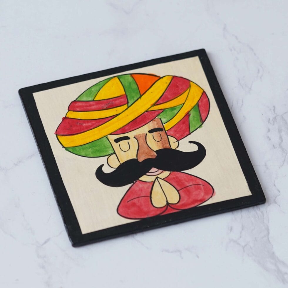 Colorful Rajasthani turban man coasters, handcrafted wooden set for festive and cultural table settings