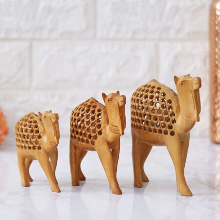 Handmade wooden camel décor set symbolizing Rajasthan’s desert heritage – ideal for gifting.