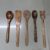Handcrafted wooden kitchen spatula and spoon set made from natural wood – eco-friendly and durable.