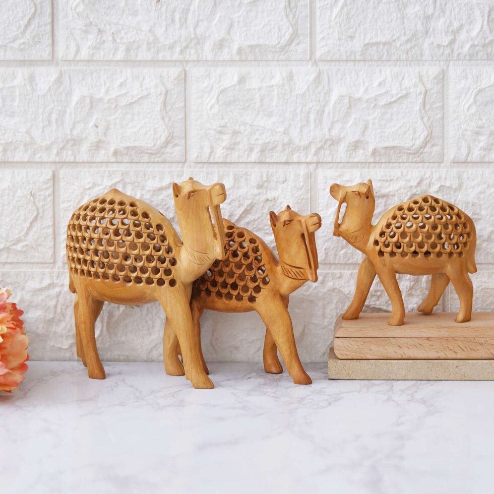 Artistic jali-carved camel sculptures, perfect for adding an ethnic touch to your living space.