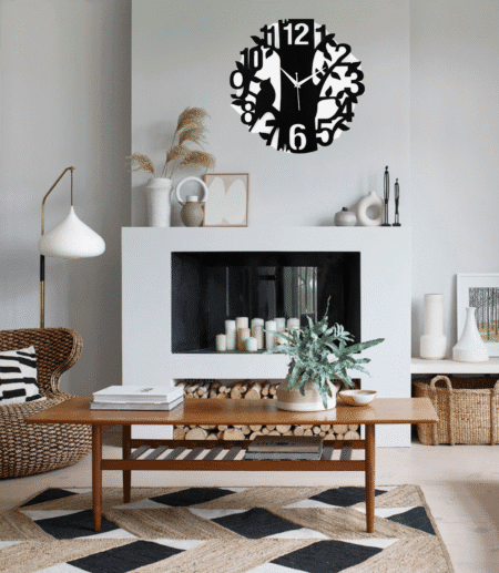 Black and white metal wall art clock for modern living room decor.