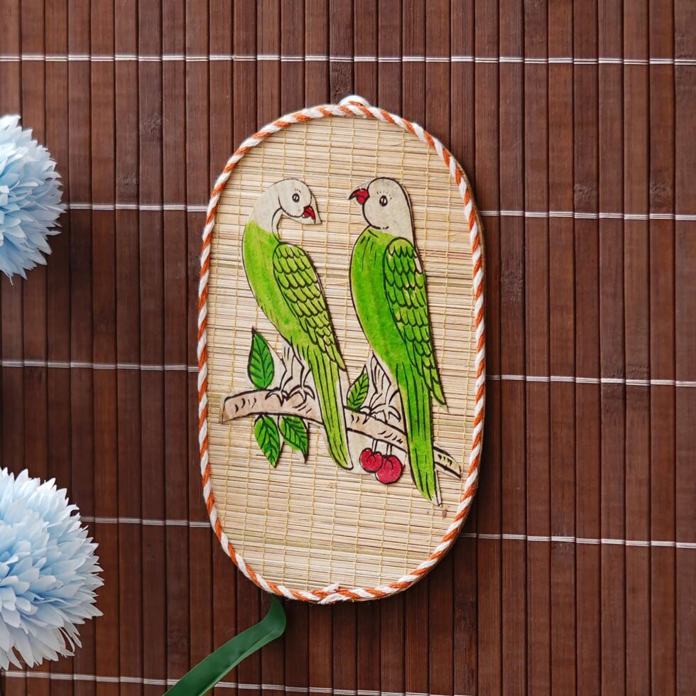 Ethnic bamboo wall art featuring two parrots on branch, eco-friendly Diwali decoration and gifting