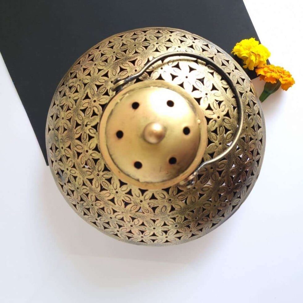 Antique brass aroma diffuser emitting smoke, elegant decor piece for Diwali puja and gifting