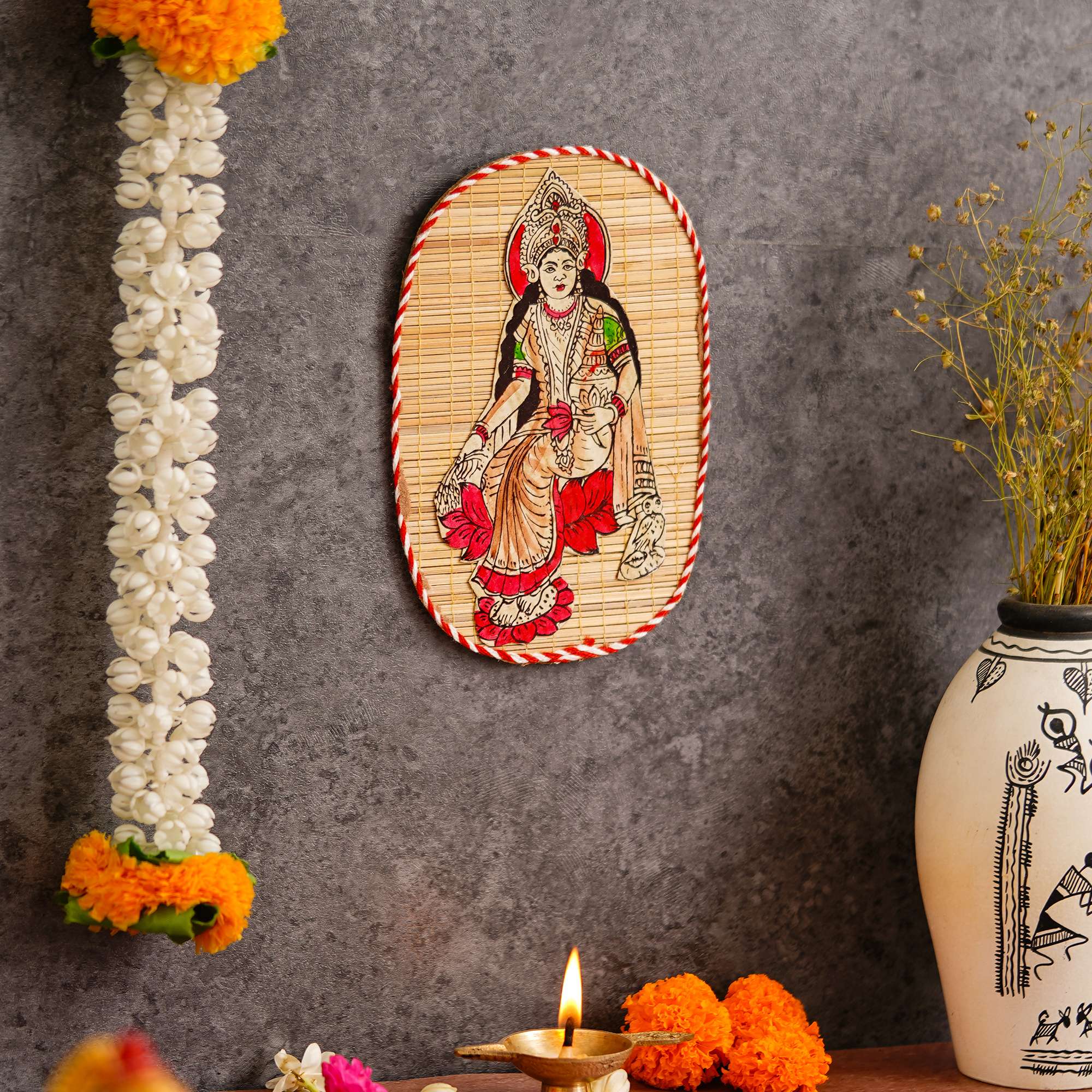 Artisan-crafted bamboo wall decor depicting Lakshmi Maa, cultural Indian art for Diwali festive interiors