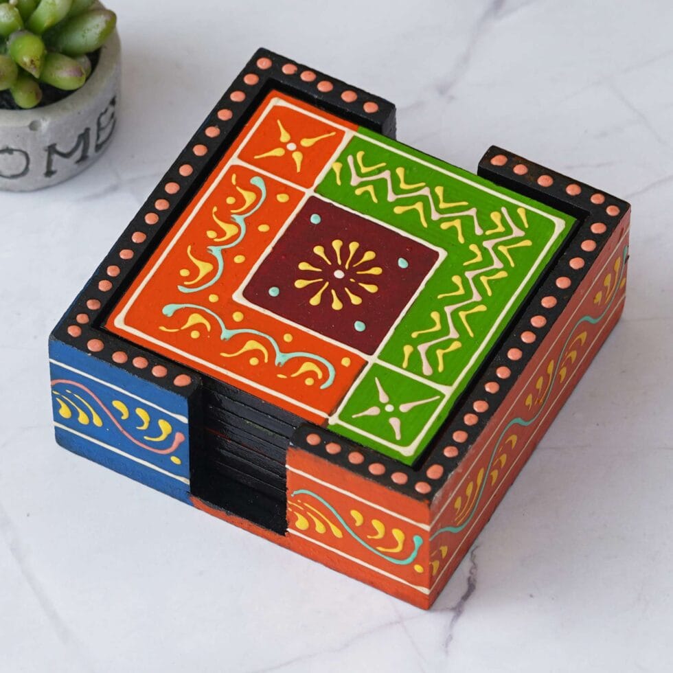 Decorative multicolor wooden coaster set, traditional Indian folk art for festive home and dining decor