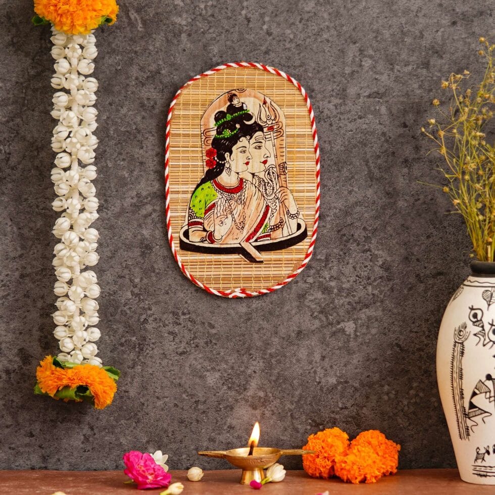 Artisan-crafted bamboo wall decor with Shiva Parvati design, ideal for Diwali cultural interiors