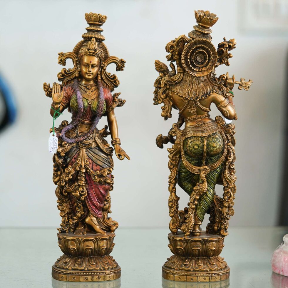 Antique brass Radha Krishna idols with intricate detailing, perfect spiritual gift for Diwali festival