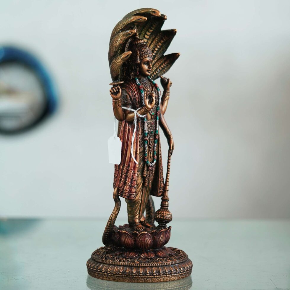 Antique bronze Vishnu idol standing on lotus, perfect spiritual gift for Diwali festival