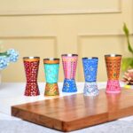 Vibrant enamel-painted steel drinkware set, handcrafted in traditional Indian style