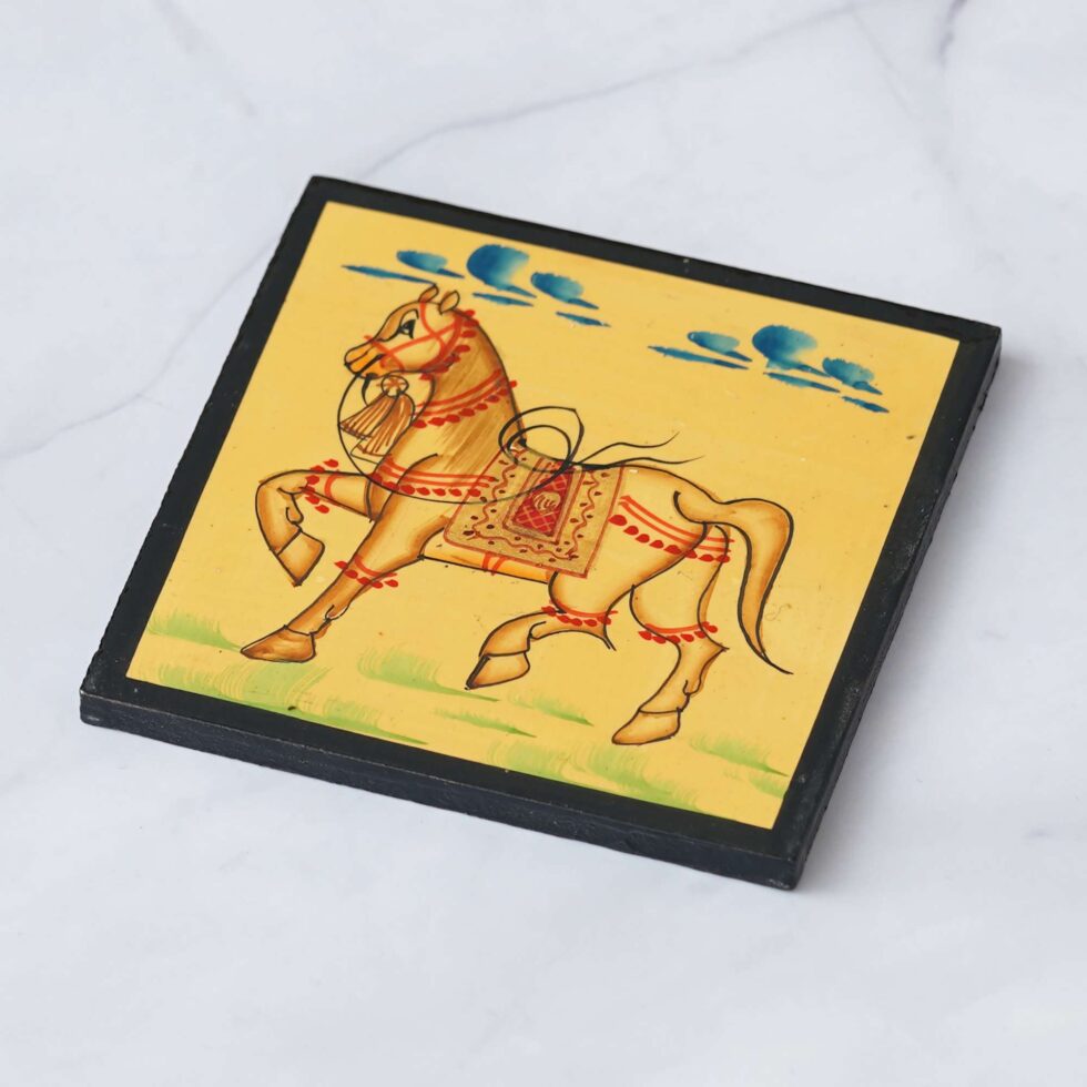 Artisan-crafted wooden coaster set with hand-painted horse motif, elegant handmade tableware gift