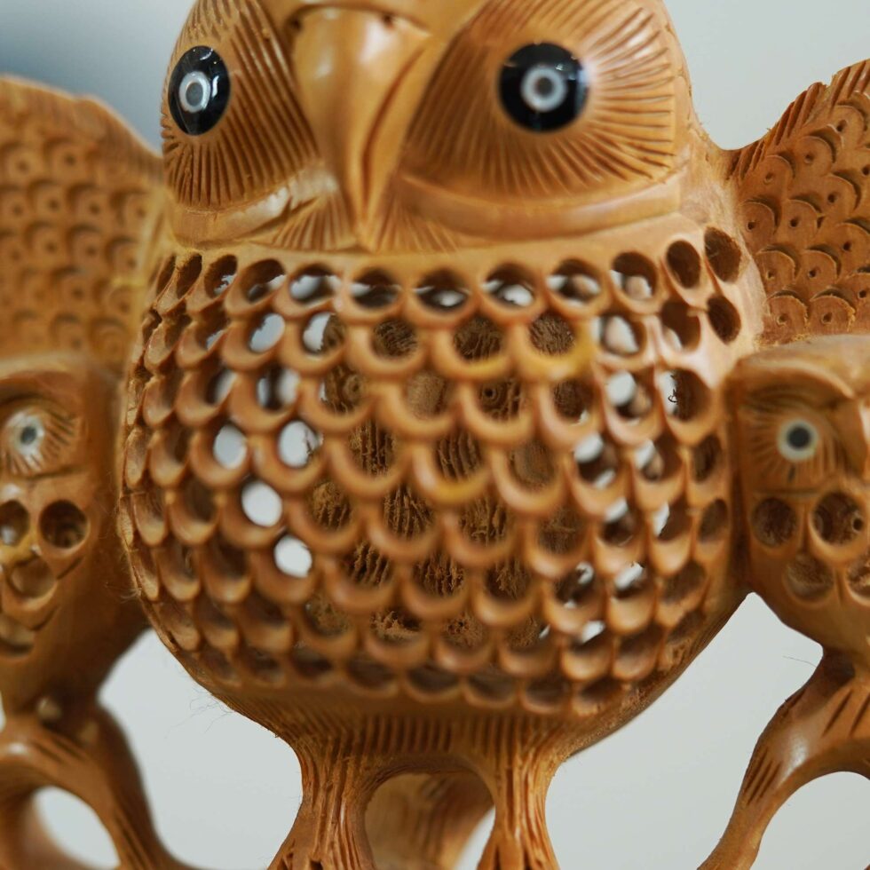 Artisan-crafted owl figurine in natural wood finish – decorative showpiece for home or office