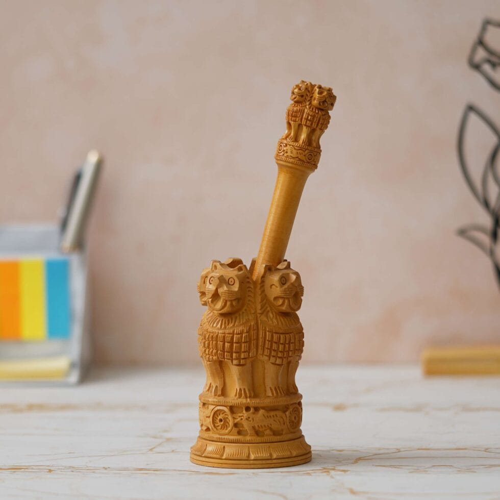 Hand-carved wooden Ashoka Pillar miniature, detailed Indian national emblem home decor piece.