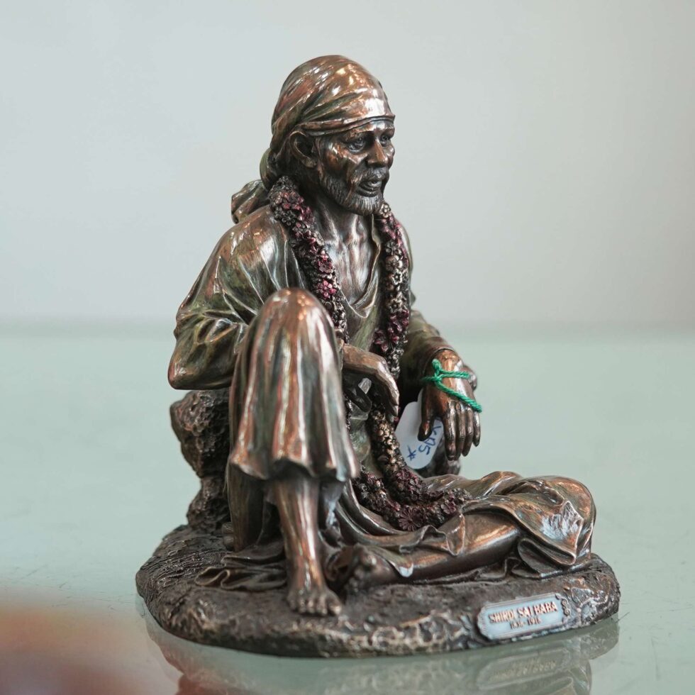 Antique bronze Sai Baba idol in blessing pose, perfect spiritual gift for Diwali festival