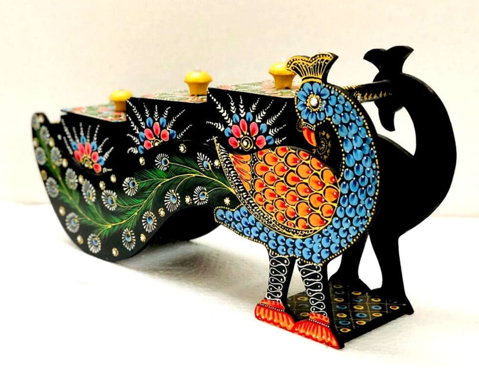 Hand-painted wooden peacock spice box – traditional Indian kitchen decor with colorful detailing