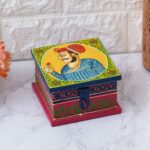 Decorative wooden gift boxes with colorful detailing and ethnic charm.