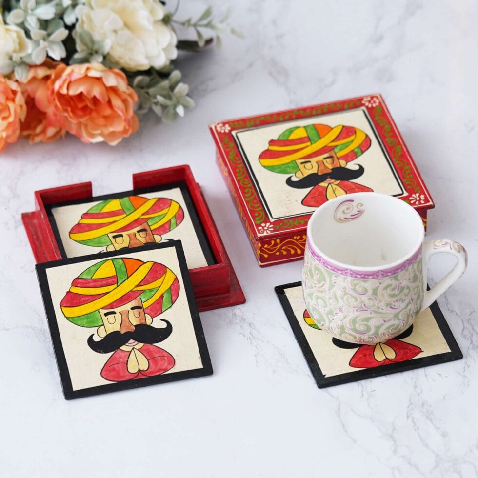 Hand-painted Rajasthani wooden coaster set featuring traditional mustache man art, perfect for ethnic home décor