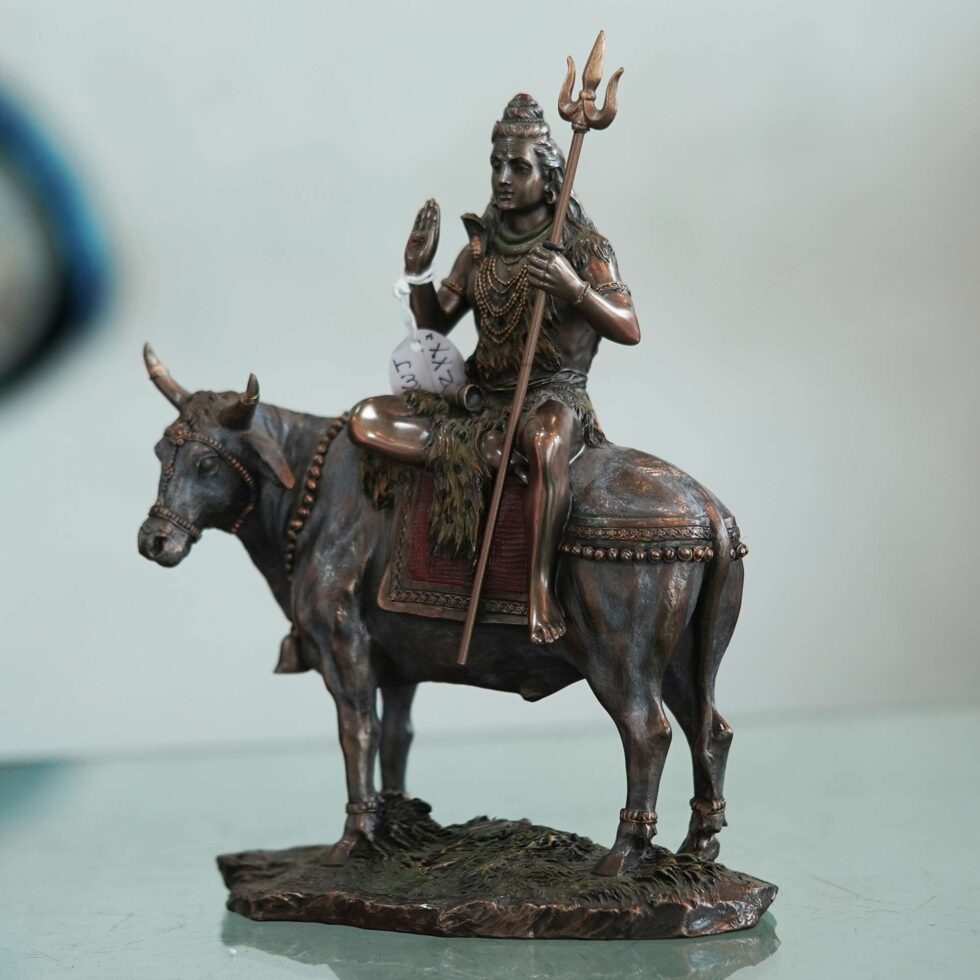 Artisan-crafted bronze Lord Shiva idol on Nandi, elegant handmade decor for festive interiors