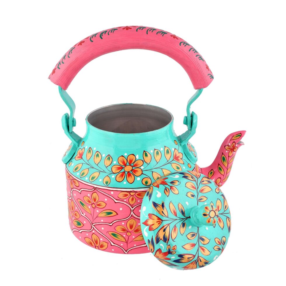Handmade stainless steel kettle with ethnic floral artwork, perfect for decor and serving